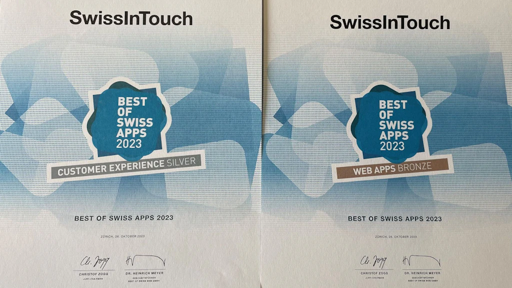 Das Bild zeigt die zwei Auszeichnungen Silber und Bronze am Best of Swiss Apps Awards 2023.